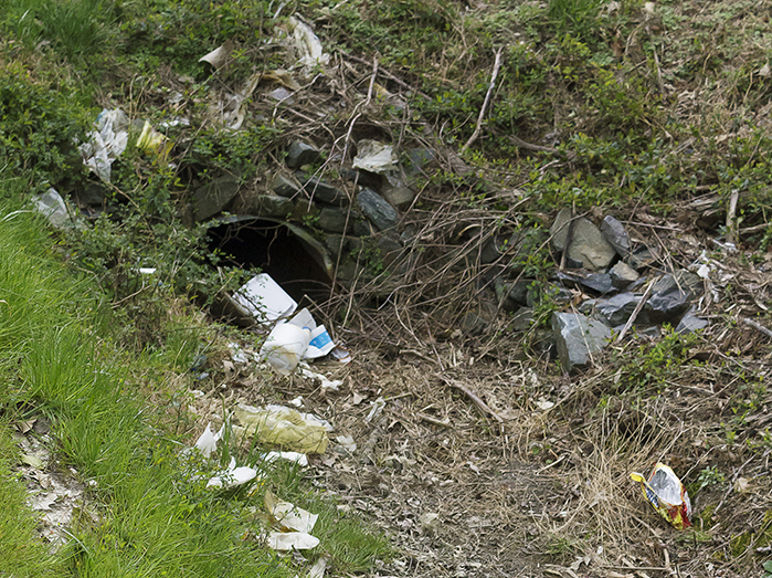 A culvert blocked by various pieces of plastic garbage - taken by MCM