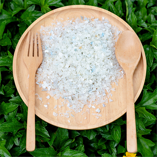 A plate covered in a pile of microplastics, from Canva